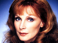 Beverly Crusher -  	  STARFLEET PERSONNEL FILE: Crusher, Beverly Rank: Commander Current assignment: Chief Medical Officer, U.S.S. Enterprise (detached service upon loss of vessel in 2371) Full Name: Beverly Cheryl Howard Crusher Date of birth: Oct. 13, 2324 Place of birth: Copernicus City, Luna Parents: Paul and Isabel Howard Education: Starfleet Academy and Medical School, 2342-50 Marital status: Widowed; married Jack Crusher 2348-55 Children: One son, Wesley Robert Crusher, born July 29, 2349 Quarters: Formerly, Enterprise-D: Deck 8/Room 2133 Office: Formerly, Enterprise-D: Deck 12/Room 1629