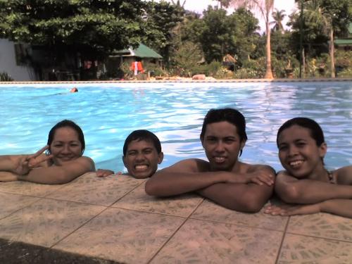 swimming in the pool - swimming and picture taking by the pool. haha..