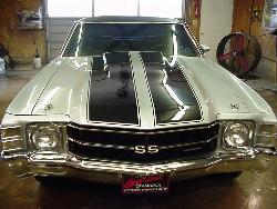 1971 Chevelle SS - This is my 1971 Chevelle SS.  It was sold several years ago, and I plan to get another soon to restore.  The Chevrolet Chevelle SS represented Chevrolet's entry into the hot midsize muscle car battle. The Chevelle SS was the high performance version of Chevrolet's Chevelle, and had its own line of engines and performance equipment. At first caught napping with just a 327 V8, the Chevelle SS would soon sport powerful 396 V8s and eventually the most powerful rated engine in muscle car history, the LS6 454 in 1970. The Chevelle, along with the Pontiac GTO, remains one of the most popular cars from this era and with good reason. Its strong performance at a reasonable price made it popular on the street and at the track.  1971 saw the collapse of muscle car performance. In response to GM's edict that all engines ran on unleaded fuel and to meet ever restrictive emission standards, Chevrolet detuned all its engines and introduced two new entry level engines. The standard engine was now a 350 V8 two barrel that put out a meager 245bhp through a single exhaust! Also available was a 350 V8 four barrel that put out 270bhp. The 402 engine that was previously still known as a 396 was renamed the 'Turbo Jet 400' and offered only 300bhp, down from 3500bhp. The 375bhp version was no longer available. The LS6 454 was also killed, but the LS5 454 returned with 365bhp, an increase of 5bhp from 1970. All Chevelles got the new single headlight design from the Monte Carlo and could be optioned with hood stripes and the cowl induction hood. Interestingly, only the LS5 carried external engine ID; they carried 'SS 454' badges. All others only said 'SS.' That was a pretty revealing sign of the times.