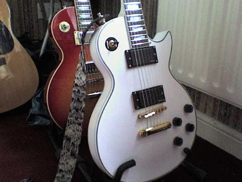 Guitar Customizing! - Les Paul Custom in white with Zakk Wylde EMG setup. Les Paul Standard with Les Paul Custom Pickups. Semi-Acoustic guitar.