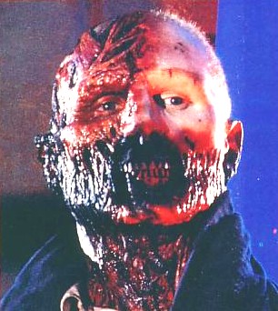 A very ugly bloody guy with hafl of a face nasty n - A very ugly bloody guy with hafl of a face nasty nasty nasty