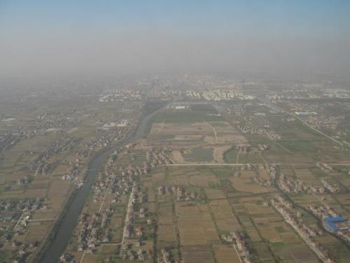 Shanghai's sky is completely gray with polution - The very worst day in Los Angeles California is like the very best day in China.
