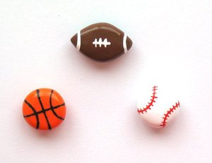 Sports Buttons - Little sports magnets. A football, a basketball, and a baseball (kinda hard to see the baseball)