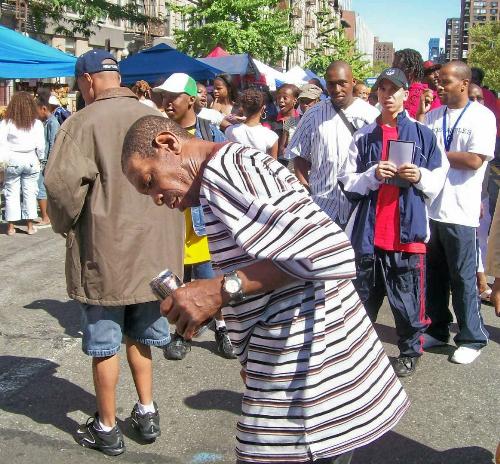 Only in New York - During Harlem Week... this man decided to party all by himself when the music was playing