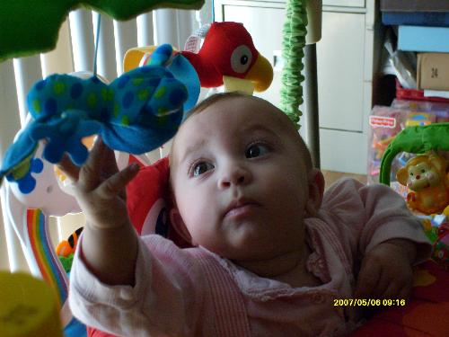baby Phoebe reaching out - This was taken when Phoebe was about 6 months old or so. She's so cute!