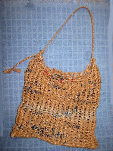 A Bag Made from Bags - I knitted this bag on a circle loom, from cut up used (but clean) grocery shopping bags. Who says I don't recycle?