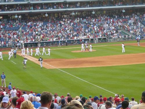 Philadelphia Phillies - Here comes the Phillies players from the bench to congratulate the players on the field for their victory over the Marlins today. They played very well and needed this win to stay in playoff contention.