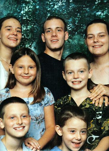 My large family - This is a picture of all 7 of my children, they range in age from 25 - 6. I had them all in perfect order girl, boy, girl, and so on.