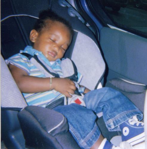 My Great-Nephew -  This is a picture of my sister's grandson. They left me alone with him in the car and I went wild taking pictures. Even though, he was already asleep.