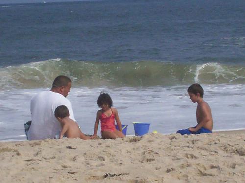 Building a sand castle - At the beach, building sandcastles with the kids.