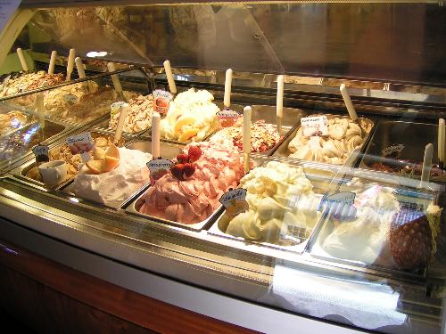 Spanish ice cream - One of two covered counters loaded with bins of various flavors of ice cream at a shop in St. Augustine, FL.