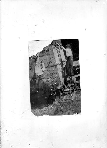My daring grandma hanging off a train in the early - grandma and unknown friend