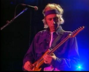 mark knopfler - mark knopfler of dire straits playing guitar