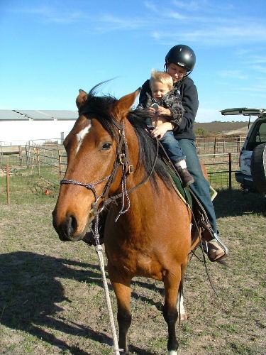 horse riding - a photo of me and my toddler son riding my horse