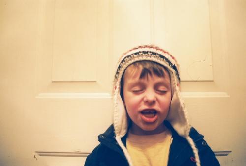 home - boy by door