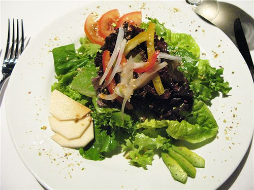 salad - several green leafy lettuce and some toppings
