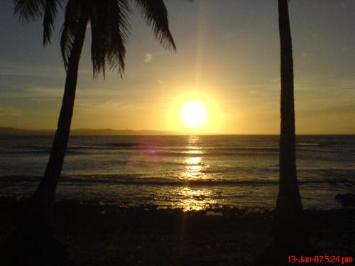 Sunset - 'Perfect sunset makes you solely holy.'   God made us wholly divine created with His likeness and image.