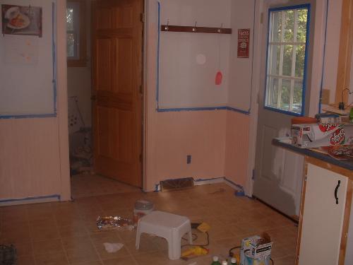 It's PEACH! - My peach kitchen. I still have the walls and doors to paint, but I've gotten the trim work around them painted.