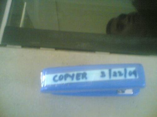 Copyer - I was in a hurry to photo copy some notes for Biology class when this little thing caught my attention. I guess the person responsible for this is the owner of the reflection.