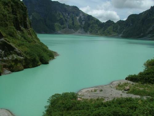 Mt. Pinatubo - Photo taken from mt. pinatubo.  Mt. Pinatubo is an active volcano from Philippines is now a tourist spot. You can now visit the place and have a swim on its Crater.