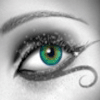 One green eye - This is a sparkly picture of one green eye.