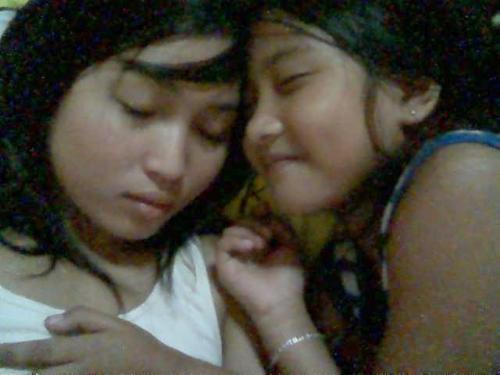 sleeping.. - me and my sister..giggling..