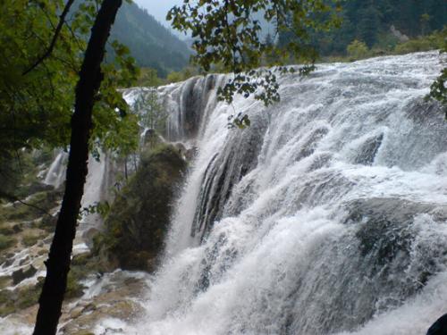 Beautiful place--fall - The picture of fall is taken from a tourist site callde 'jiuzhaigou' by my friend.If you had ever traveled here,you will attract by the natural view--beautiful fall,clear water of a variety of colors,natural forests,etc. I promise you will enjoy yourself while you visit it.