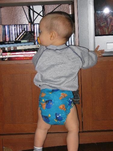 my sweet lil one in a cloth diaper - he loves showing off his nemo diaper 
