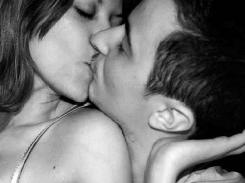 Kissing - As it should be. Both people's eyes are closed.