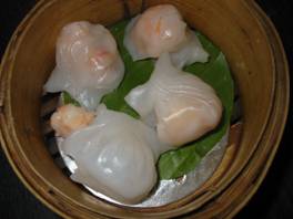 steamed shrimp dumplings - shrimp dumplings steamed in a bamboo cooker