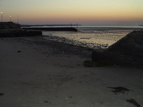 Sunset Over Ryde Beach - The view over to Portsmouth from Ryde Sea front at sun set