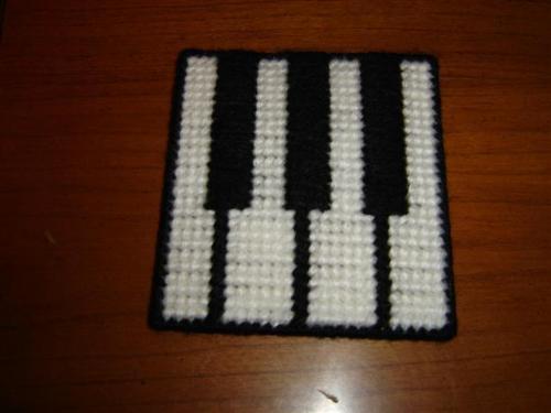 Piano Keyboard Coasters - These coasters are a small portion of what I love to work with in my spare time. Working with plastic canvas is my big addiction! Guess it could be worse.