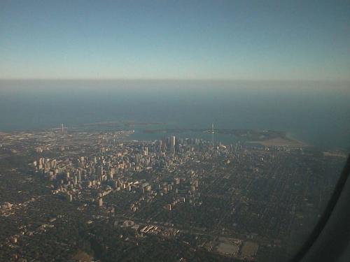 Coming In For A Landing In Toronto.... - I took this picture out the window of the plane as it was landing in Toronto on Monday night. I'd just come in from Phoenix Arizona, and was happy to be in my homeland, but rather sad that my husband had to stay in Arizona.