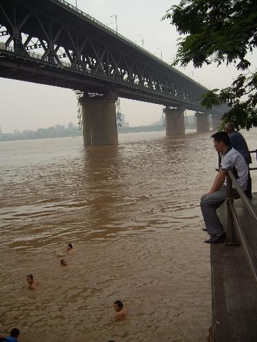 changjiang river -  this is my hometown .the river named changjiang which is Chinese socend longset river . this bridge is the first one build over this river.And now,there are many new bridge over changjiang river.  As the long river ,our country has a long and attrctive history.do you want to visit my hometown oneday?