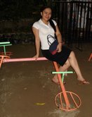 this is me.. - this was taken during a friend's wedding. i was with some friends and we were exploring the back part of the chapel and found a little park with swings and slides. we decided to take some photos there coz it was a nice location. we really ahd fun taking our pose. im going to upload more picture of me soon.. :)