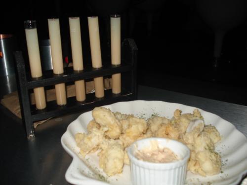 calamares - Crunchy calamares and sweet tasty dip are featured here.