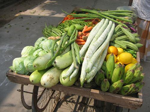 vegetables - Variety of fresh vegetables being sold on a street