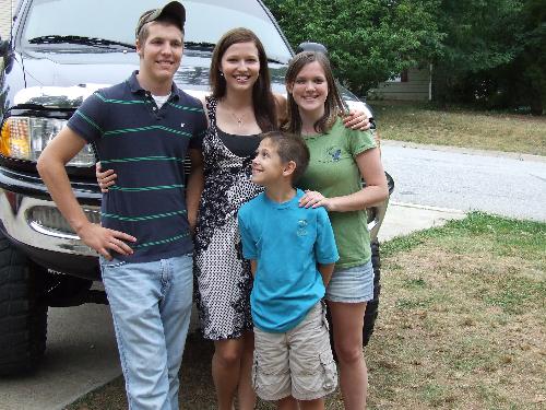 my 4 children - These are my 4 children, in front of my son's huge truck.