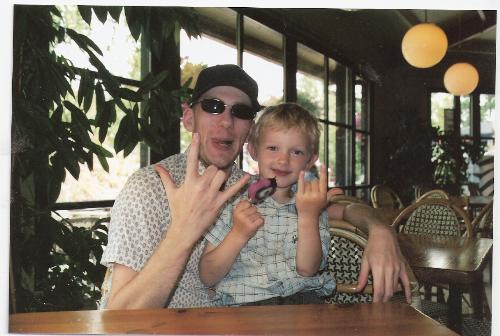 Throwing handsigns :D - My nephew and I was in the zoo together. Was a fun day but exhausting :D  I sat and taught him some signs he could make his hands for the fun of it, and just as I look at his mom she pops a picture... a bit opportune for me, Im looking like a dork, but hey, it was fun :D