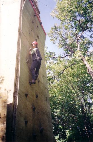 Rock Wall Climbing and Having a Blast! - This photo was taken at a Big Brother Big Sister event. Many of the kids who were waaaayyy younger than me wouldn&#039;t try it. I was determined to let them know that age is only a number. I made it all the way to the top and have climbed it a couple of times since...and rock wall climbing is one of my favorite things to do.
