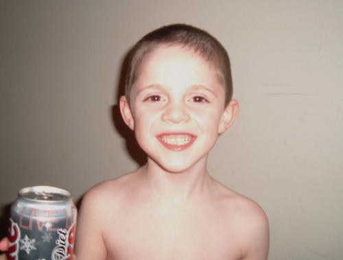 My son, Daniel... - Daniel, holding a coke with a huge smile on his face!