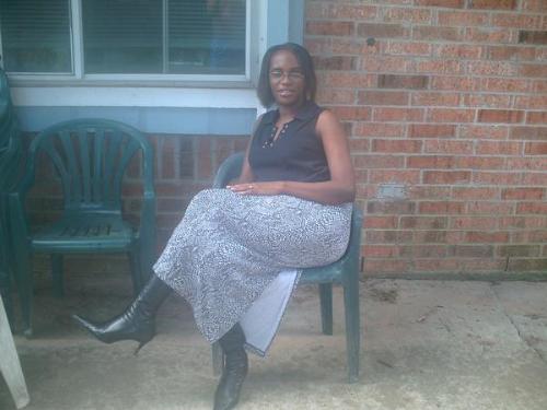 just relaxing - me just relaxing on a nice cool breezy day in my lovely backyard