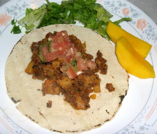Soyrizo and Potato Tacos - Yummy breakfast or lunch! Soyrizo (vegan chorizo) cooked w/ potatoes and served on a tortilla and fresh salsa.