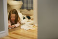 Toddler getting into trouble - Shows a toddler with what looks to be toilet paper all over the floor. This photo came from Fotosearch.com and it is Royalty Free!