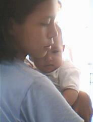 me and my baby girl - this photo was taken by my brother. it was a stolen shot.