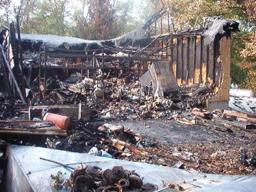 Burned down pantry - This is one of 2 pics I took before we started cleaning the rubble up. Total loss of 2 semi-loads of food plus their personal belongings. It was a huge 4-car garage with 3/4 of it being the food pantry.