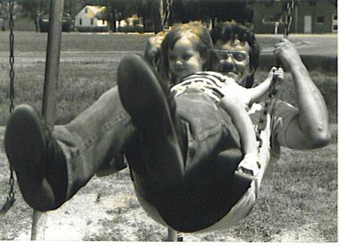 Just A Swing  - This a picture of me and my dad swing when i was young and of course dad was still alive