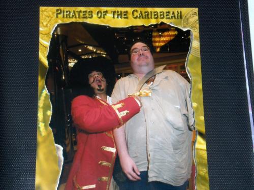 Cruise ship pirate - From my Halloween 2006 cruise on the 'Carnival Valor.' I had my photo taken with a pirate outside the dining room after dinner.