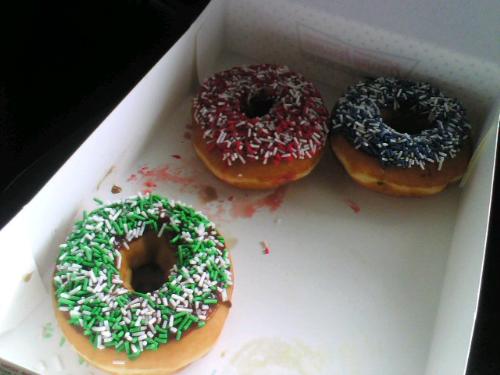 Krispy Kreme UAAP Final 3(4) Donuts - Taken after the last Ateneo-La Salle game. I didn't know this would be symbolic. Animo La Salle!