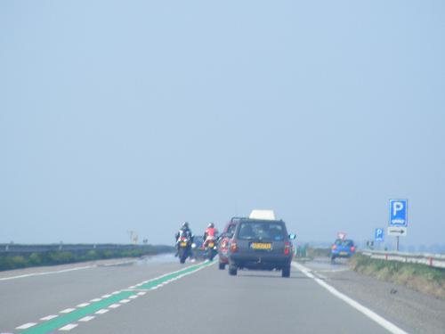 bikers doing dangerous things - check this shot, the 3 bikers were definitely crazy, do you see the car on the other side of the road, and they still are doing what they shouldn't have?